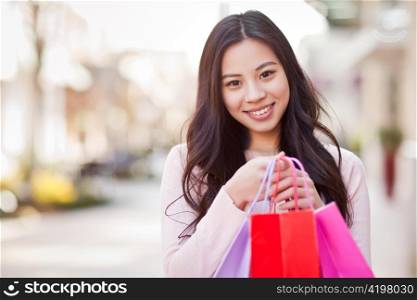 A shot of an asian woman shopping outdoor