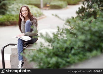 A shot of an ethnic student talking on the phone