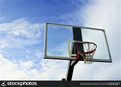 A shot of an outdoor basketball hoop
