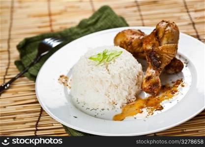 A shot of chicken curry dish on white plate