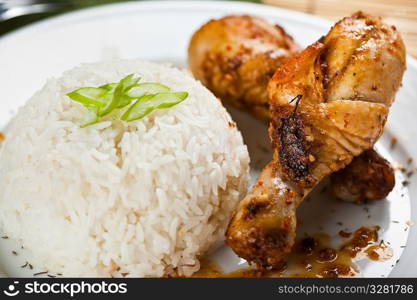 A shot of chicken curry dish on white plate