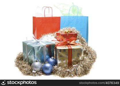 A shot of christmas presents with gift boxes and ornaments