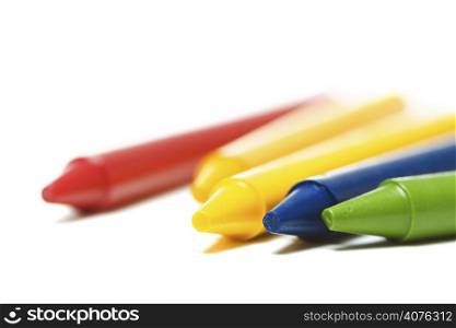 A shot of colorful crayons on white