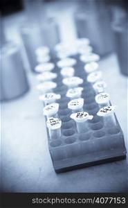 A shot of DNA samples in a laboratory in blue tone