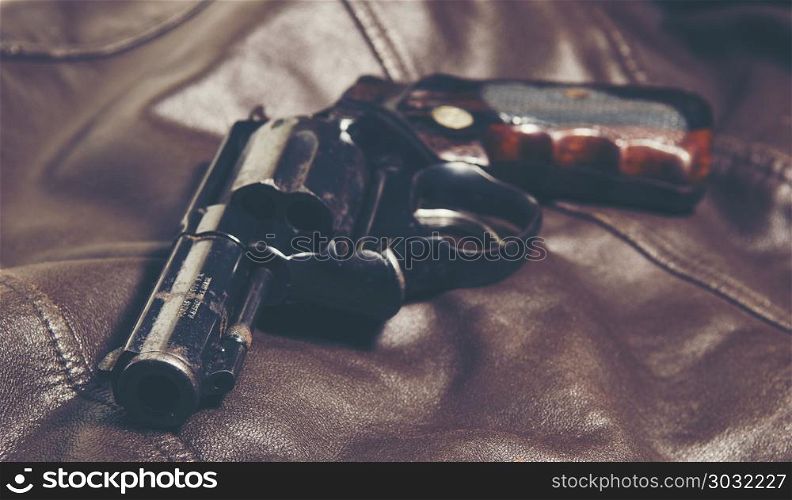 A shotgun Revolvers