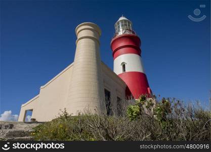 A side view of the lighthouse at Cape Agulhas showing one of the two towers.