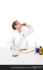 A silly chemist taking a sip from some sort of solutions in a bottle, experimenting on himself. Do not try this at home!