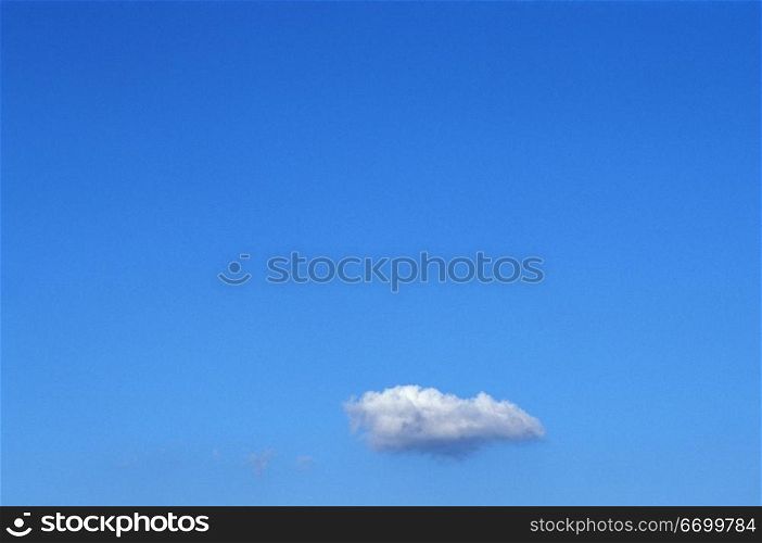 A Single Cloud In An Otherwise Clear Blue Sky