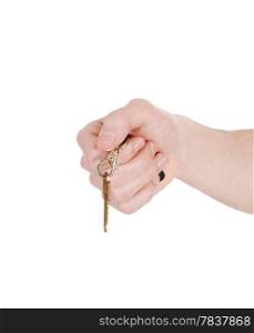 A single male hand holding a house key, isolated on whitebackground.