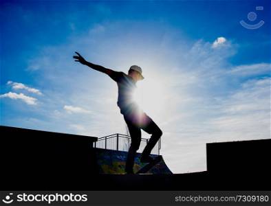  a Skater riding the skate in a half pipe in a skate park in lisbon