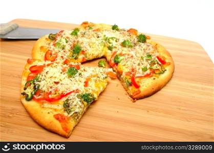 A slice of gourmet veggie pizza topped with sharp cheddar and asiago cheese, fresh tomatoes, red bell pepper, mild jalapeno chilie, broccoli and dried herbs. Gourmet Veggie Pizza