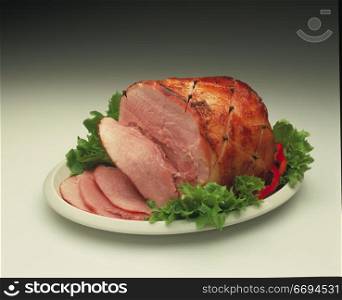 a sliced ham joint