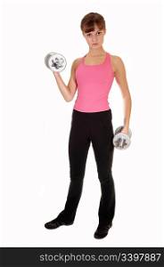 A slim teenage girl with dumbbells doing some weight lifting in the studioas exercise to stay fit, for white background.
