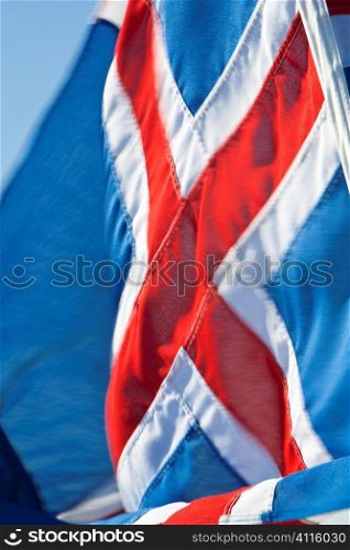 A slow shutter speed shot of the Icelandic flag with deliberate motion blur