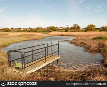 a sluice outside in the country with river lake