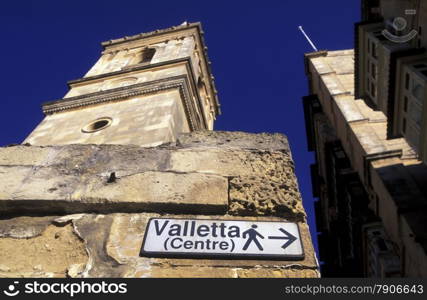 A smal road in the centre of the Old Town of the city of Valletta on the Island of Malta in the Mediterranean Sea in Europe.&#xA;