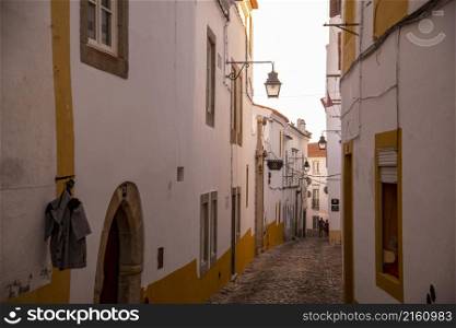a small alley in the old Town of the city Evora in Alentejo in Portugal. Portugal, Evora, October, 2021