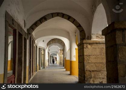 a small alley in the old Town of the city Evora in Alentejo in Portugal. Portugal, Evora, October, 2021