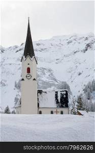 A small church, in a tiny village in the Austrian Alps