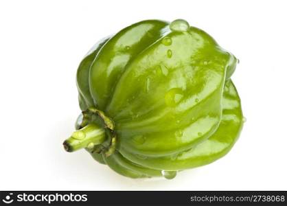 A small green bell pepper on white background Eastern. Eastern green bell pepper