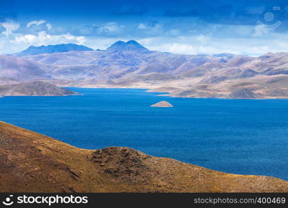 a small island in the mountain lake