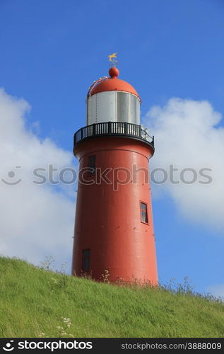 A small vintage lighthouse at the North Sea Coast