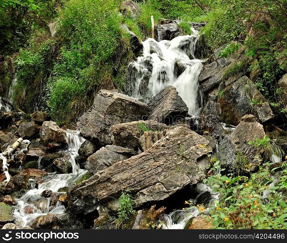 a small waterfall in the forest