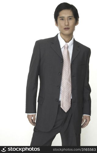 A smart asian businessman in a suit