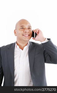 A smiling African American business man talking on cellphone over white background