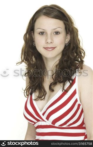A smiling beautiful young woman in red and white