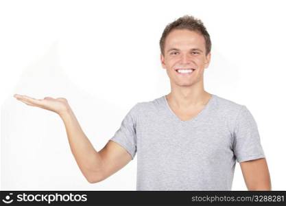 a smiling man presents with an open palm isolated on white background