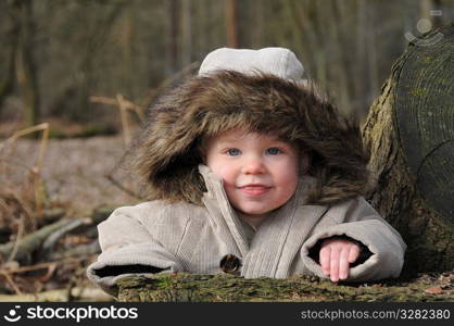 A smiling toddler.