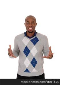 A smiling young African American man standing with his hands open making an inviting pose, isolated for white background