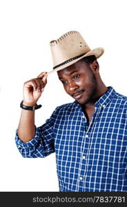 A smiling young black man in a blue shirt and an cowboy hat on his headstanding isolated for white background.