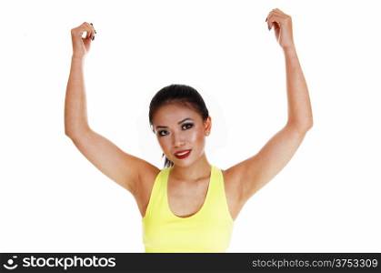 A smiling young Chinese woman in exercise outfit showing off her bicepswith her long black hair for white background.