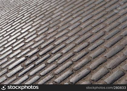 a smooth paving stone, road paving stones, cobblestones. road paving stones, cobblestones