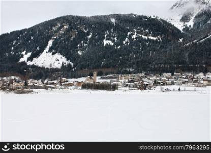 A snow-covered mountain village, in Western Switzerland
