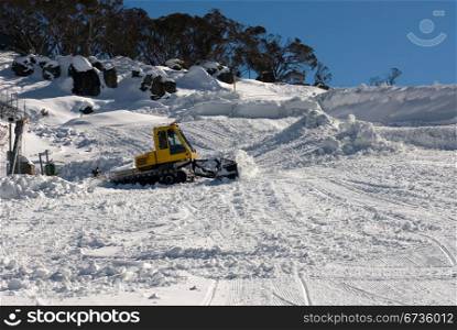 A snow grooming machine in operation, Perisher Valley, Australia
