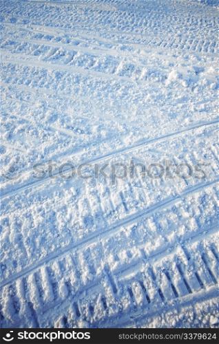 A snow texture created on a snowmobile road