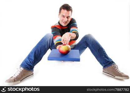 A sound mind in a healthy body - concept of mental nutrition - man with book and apple white background