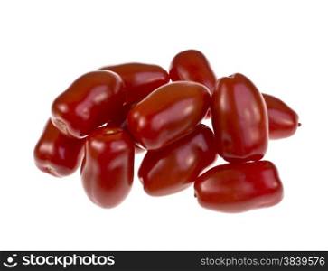 A special variety of small roma tomatoes on white background