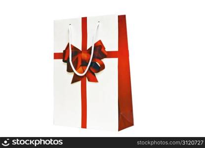 A specilty store gift bag with a printed ribbon and bow. Isolated on a white background with a clipping path
