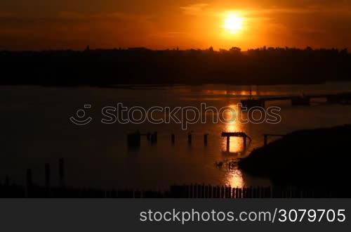 A spectacular sunset in a harbour when no one&acute;s around