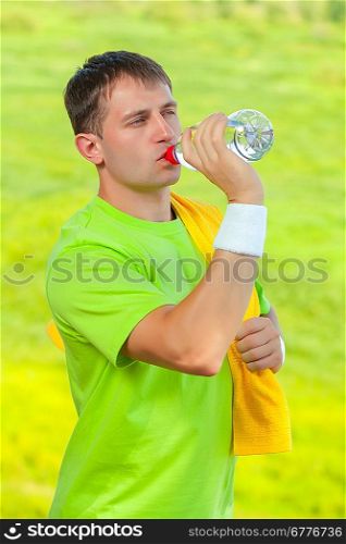 a sportsman drinking water