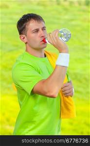 a sportsman drinking water