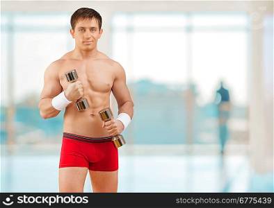 a sportsman holding weights