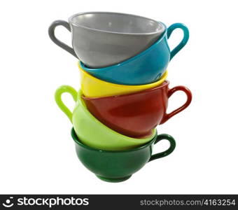 a stack of colorful coffee or tea cups