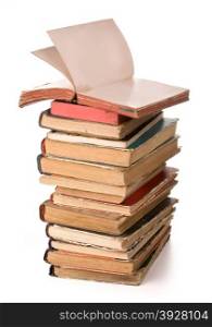 a stack of old books on white background