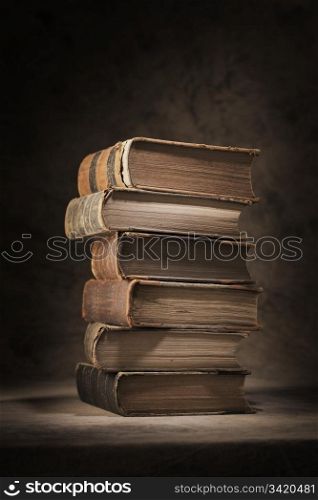 A Stack of old worn and tattered books.