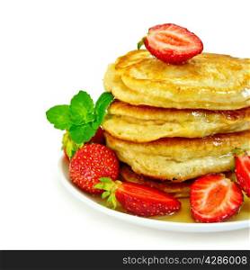 A stack of pancakes with strawberries, mint and honey on a white plate isolated on white background